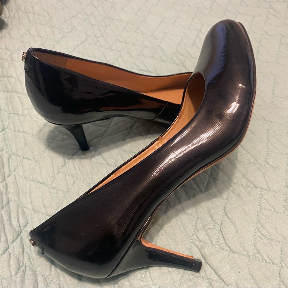 Beautiful black shiny designer shoes!   Perfect condition!    Only worn 1 time!